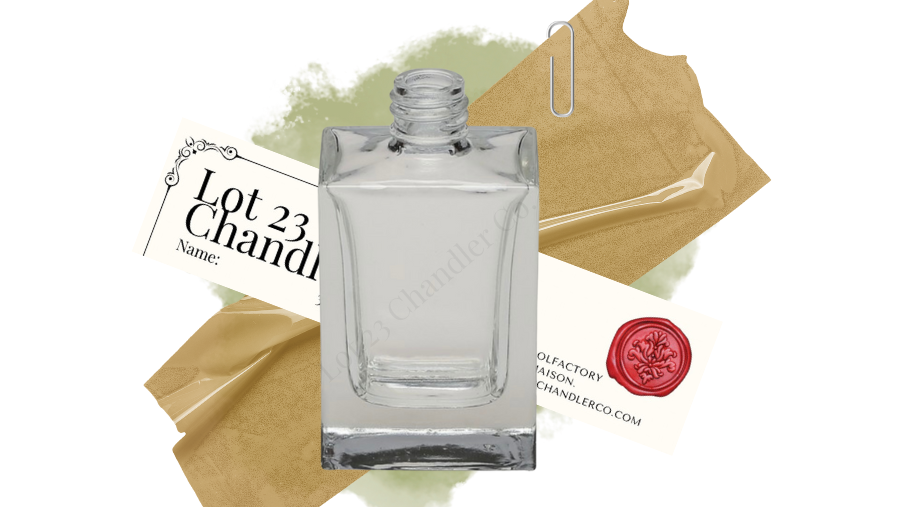 Clear glass bottle with 'Lot 23 Chandlery' branding on a white background